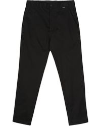 Calvin Klein - Logo-tag Tapered-leg Trousers - Lyst