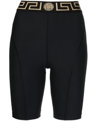 Versace - Shorts con banda del logo - Lyst
