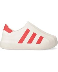 adidas - Adifoam Superstar Slip-On Sneakers Met Drie Strepen - Lyst