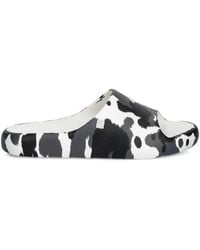 Melissa - Free Cow-Print Slides - Lyst