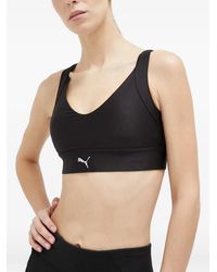 PUMA - Logo-Print Racerback Bra - Lyst