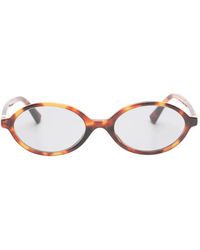 Miu Miu - Tortoiseshell-Effect Oval-Frame Sunglasses - Lyst
