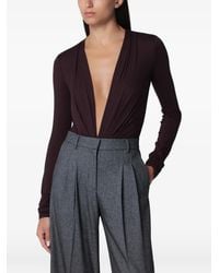 ANDAMANE - Zelda Deep V-Neck Bodysuit - Lyst