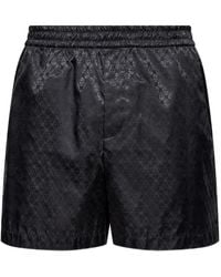 McQueen - Skull-Patterned Shorts - Lyst