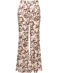 Aeron - Abstract-print Flared Satin Trousers - Lyst