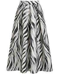 Lunatica Milano - Savanna Zebra-Print Pleated Midi Skirt - Lyst
