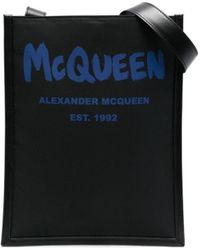 Alexander McQueen Leer Clutch Met Logoprint in het Blauw voor heren Heren Tassen voor voor Buidels voor 