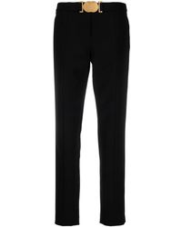 Moschino - Smiley-buckle Tapered Trousers - Lyst