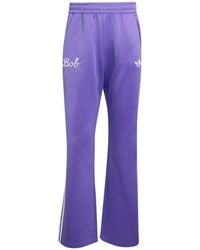 adidas - X Bob Marley Flared Broek Met Zijstrepen - Lyst