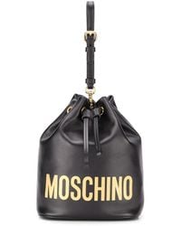 Moschino - Beuteltasche mit Logo-Schild - Lyst
