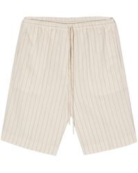 TOTEME - Drawstring-Waist Pinstripe Shorts - Lyst