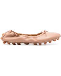 Tod's - Ballerine gommino rosa - Lyst