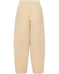 Ganni - Curve Tapered-Leg Trousers - Lyst