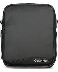 Calvin Klein - Logo-Print Messenger Bag - Lyst