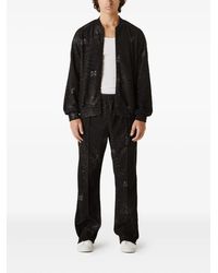 Needles - Pantalones de chándal con estampado web - Lyst