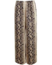 KHAITE - Mindy Snake-Print Crop Trousers - Lyst