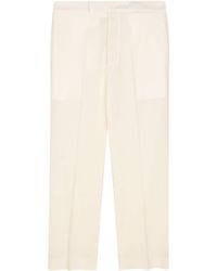 SAPIO - Pressed-crease Wool Tapered Trousers - Lyst
