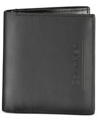 Calvin Klein - Embossed-Logo Bifold Wallet - Lyst