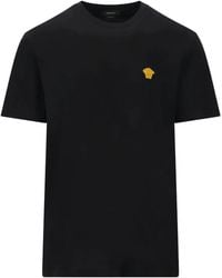 Versace - T -Shirts und Polos schwarz - Lyst