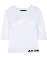 DKNY - Geripptes Strickoberteil mit Cut-Out - Lyst