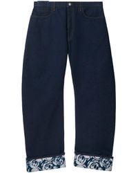 Burberry - Jeans a gamba ampia con applicazione - Lyst