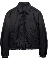 Prada - Plumífero con logo triangular - Lyst