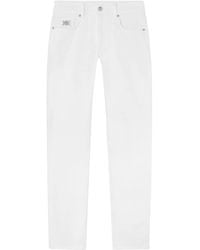 Versace - Vaqueros rectos con detalle Medusa Head - Lyst