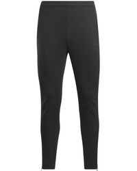 Reebok - Pantalones De Chándal Strength De Punto - Lyst
