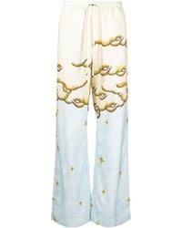 Amiri - Sunscape-print Flared Trousers - Lyst