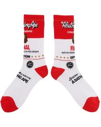 SAINT Mxxxxxx - Logo-Print Intarsia-Knit Socks - Lyst