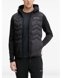 Peak Performance - Plumífero con capucha - Lyst