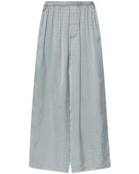 Balenciaga - Logo-Print Trousers - Lyst