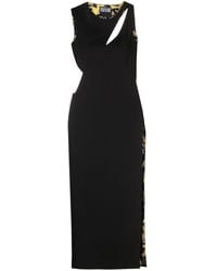 Versace - Vestido largo con aberturas - Lyst