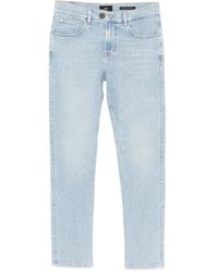 7 For All Mankind - Slimmy Tapered Logo-Patch Jeans - Lyst