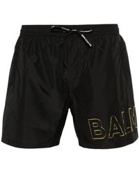 Balmain - Embossed-logo Swim Shorts - Lyst