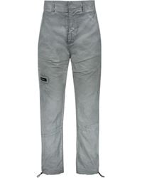 ISO.POETISM - Logo-Patch Trousers - Lyst