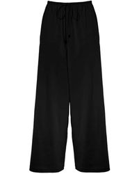 Wolford - Summer Flow Drawstring Palazzo Pants - Lyst