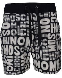 Moschino - Logo-Print Cotton Shorts - Lyst