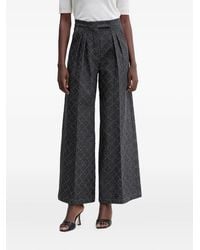 SIMONA CORSELLINI - Pleated Patterned Trousers - Lyst