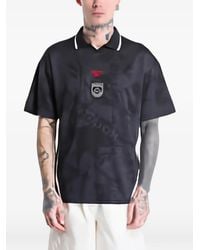 Reebok - Logo-Print Collared T-Shirt - Lyst