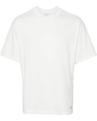 Saint Laurent - T-Shirt Mit Logo-Patch - Lyst