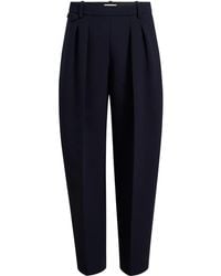 KHAITE - Button-detail Pleated Trousers - Lyst