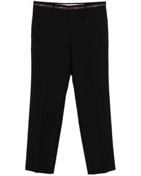 Gucci - Pantalones con franja del logo - Lyst