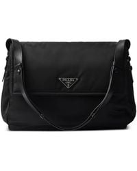 Prada - Traveller Medium Padded Re-Nylon Bag - Lyst