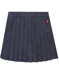 A Bathing Ape - Heart-Badge Pleated Mini Skirt - Lyst