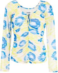Ganni - Geraffte Bluse aus Mesh mit Blumen-Print - Lyst