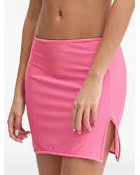 Guess - Minijupe Fendue À Patch Logo - Lyst