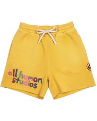 ALL HUMAN - Embroidered Distressed Track Shorts - Lyst
