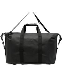 Rains - Hilo Logo-Embossed Weekend Bag - Lyst