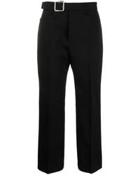 Jil Sander - Buckled Pleated Flared Wool Trousers - Lyst